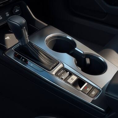 2027 Honda Civic Sedan Sport Touring Hybrid center console with gear shifter and cup holders interior (Compact Sedan)